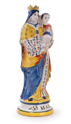 an image of a figurine of a woman holding a child