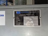 a sign on the side of a machine that is on display