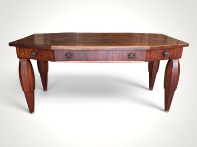 an image of a wooden table with drawers on it