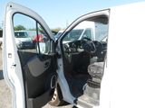 a white van with the door open and a black seat