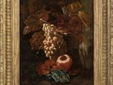 tableau représentant une nature morte composée de fruits et de fleurs, dans un cadre doré