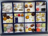 a picture of a display case filled with assorted sweets