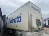 a delivery truck that is parked in a lot