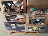 a stack of cardboard boxes on top of a pallet