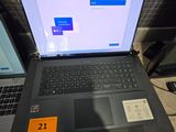 two laptops that are sitting on a table