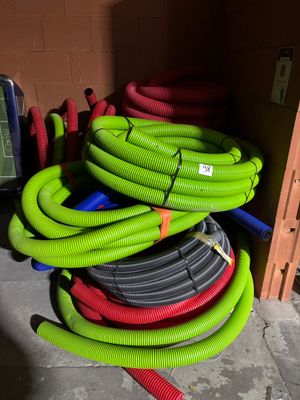 a pile of hoses stacked on top of each other