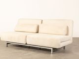 an image of a couch with two pillows on it
