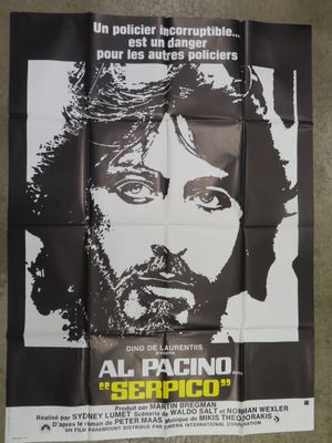 the poster for the movie ' s release shows a man with long hair and a beard