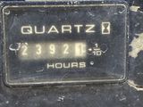 a close up of a clock on a wall