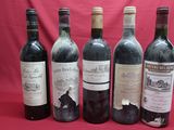 six bottles of red wine are lined up on a red background