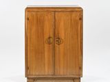 an image of a wooden cabinet with two doors on one side and a drawer on the other side