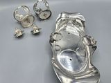 two silver plated rings and a silver plated ring