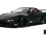 a picture of a black sports car on a white background