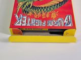 an image of a box of nintendo games on a white surface