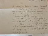 a piece of paper that has a letter written on it