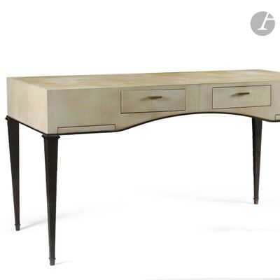 a white desk with two drawers and a black legs