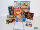 beaucoup de jeux et de livres sur la table