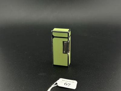 a small green refrigerator with a tag on it