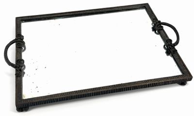a black tray with a mirror on it on a white surface