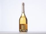 a bottle of wine that is sitting on a table