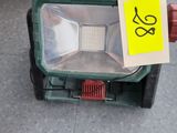 a light that is sitting on the ground in a store