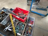 a lot of tools that are sitting on the floor