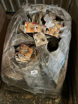 a trash can that has been wrapped up in plastic