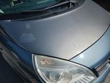a picture of a car that is parked in a parking lot