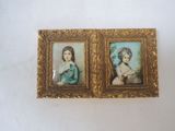 pair of antique miniature paintings of women in blue dresses on a gold frame