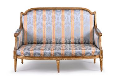 an image of a couch with a striped upholstered back