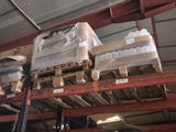a large amount of boxes on a pallet in a warehouse