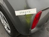 a sticker on the back of a car with a plant growing out of it