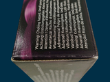 a box of hair dye sitting on a blue surface
