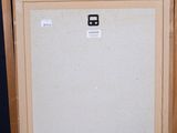 an easel with a painting on top of it on a blue background