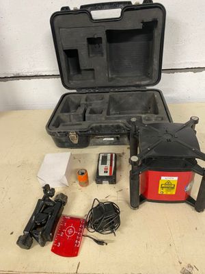 a case that has some tools in it on a table