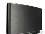 un gros plan d'une enceinte noire sur fond blanc
