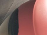 a close up view of a pink motor scooter