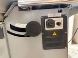 a machine that is sitting on a table in a room