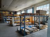 a large warehouse filled with lots of boxes and pallets