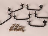 four pairs of metal hooks and screws on a white surface