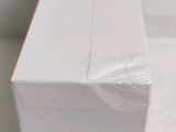 a close up of a white box on a table