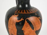 a vase that has a picture of a man and a woman on it