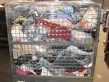 a large metal cage filled with lots of items