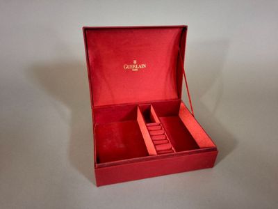 a red box that has a watch inside of it