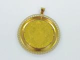 an image of a gold coin pendant with a diamond border around it
