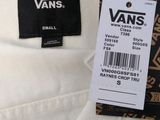 the label on a white shirt is attached to the back of the shirt