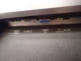 a close up of a laptop with two ports on it