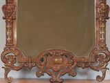 a mirror that is sitting on top of a table