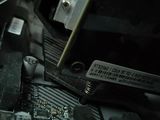 a close up of a person working on a computer motherboard