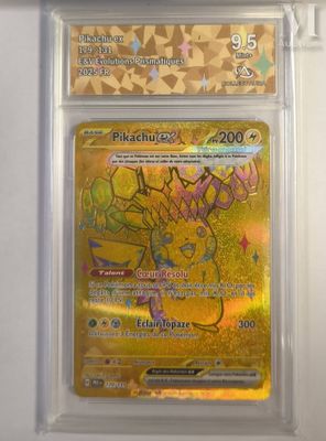 a close up of a pokemon card in a plastic case